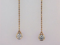 diamond (with yellow gold) hanging earrings